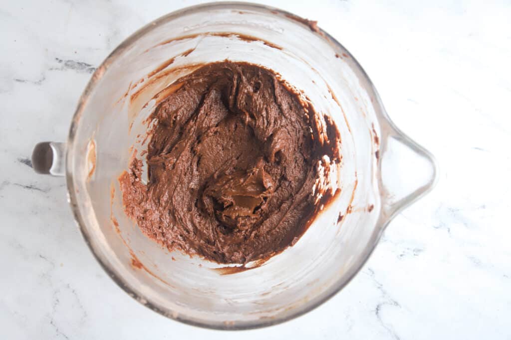 chocolate whoopie pie batter in a glass mixing bowl