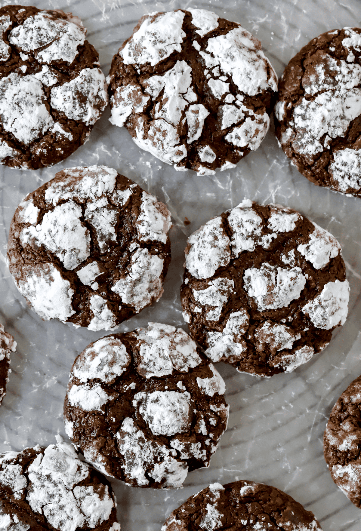 top down view of double chocolate crinkle cookies on a wire rack