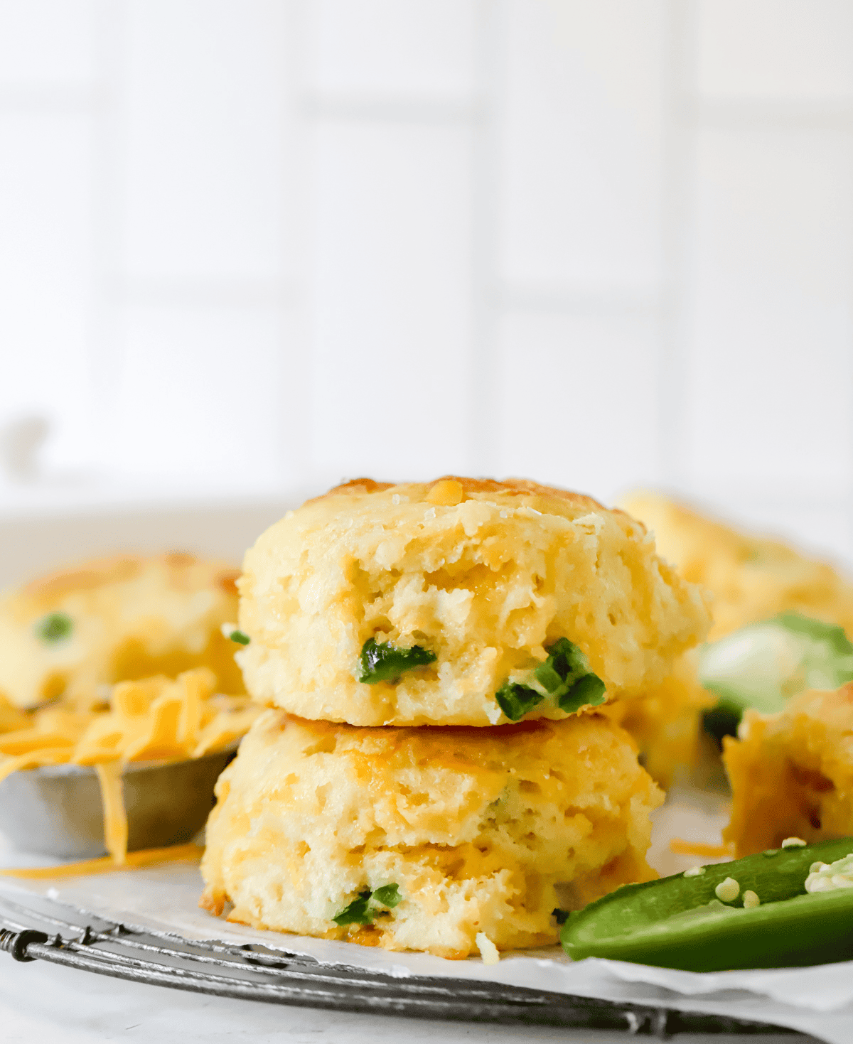 two cheddar jalapeno biscuits stacked