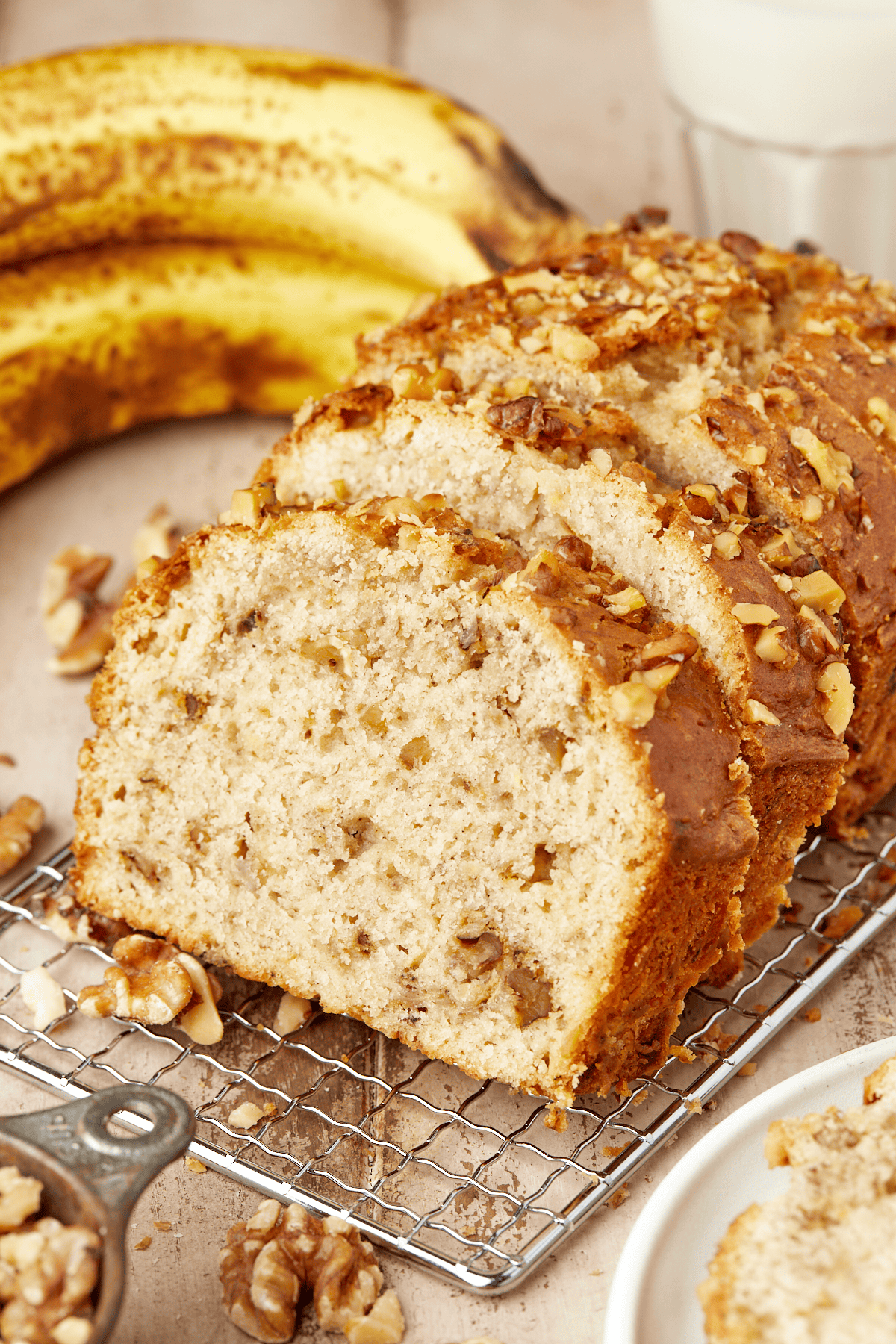sliced banana nut bread on a wire rack
