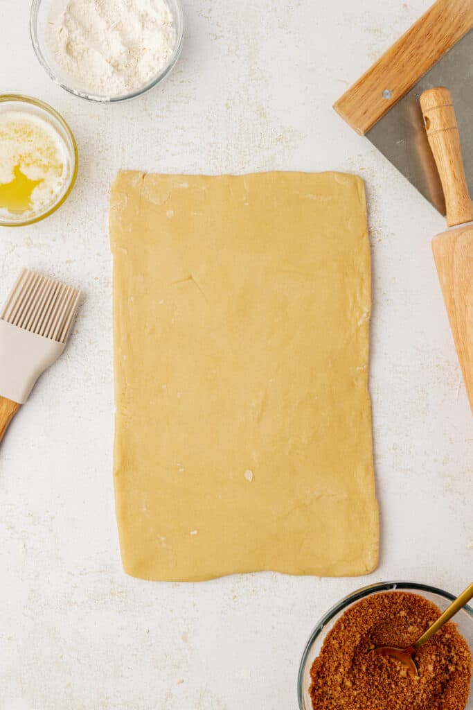 sugar cookie dough rolled out into a rectangle