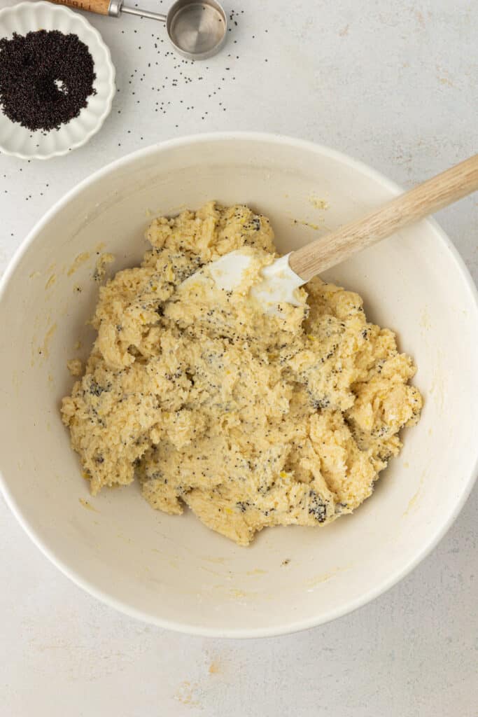 lemon scone dough in a bowl with a spatula