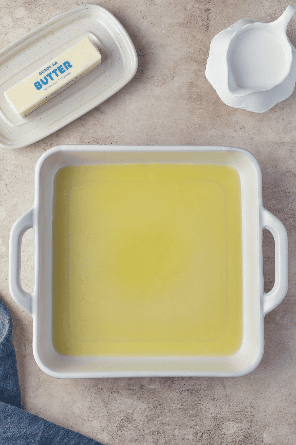 melted butter in casserole pan