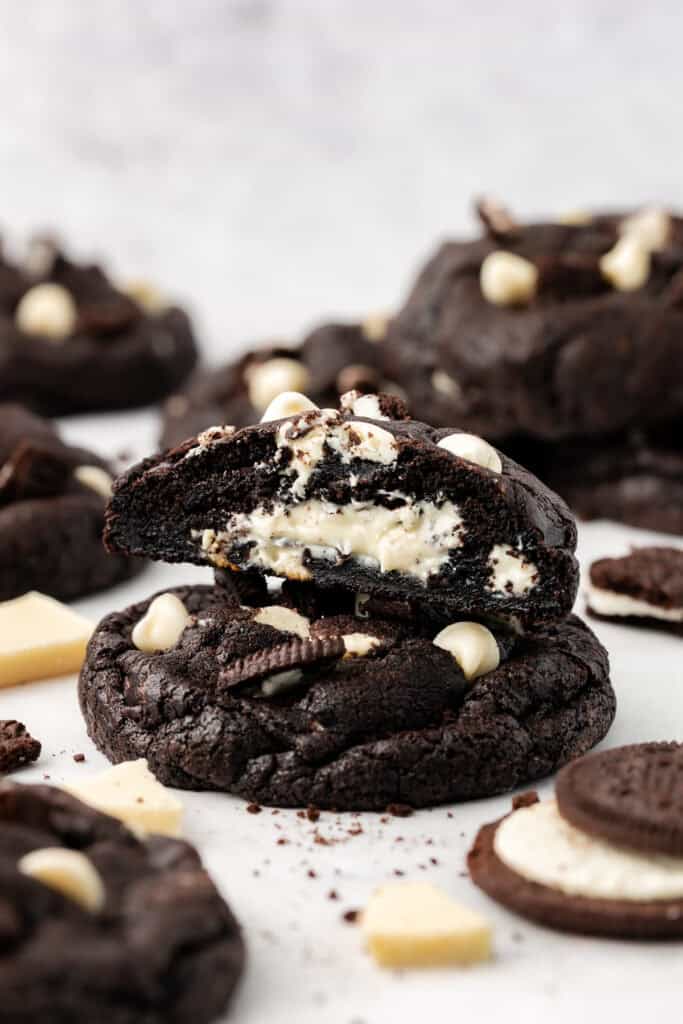 half of a cookie sitting on top of a whole cookie