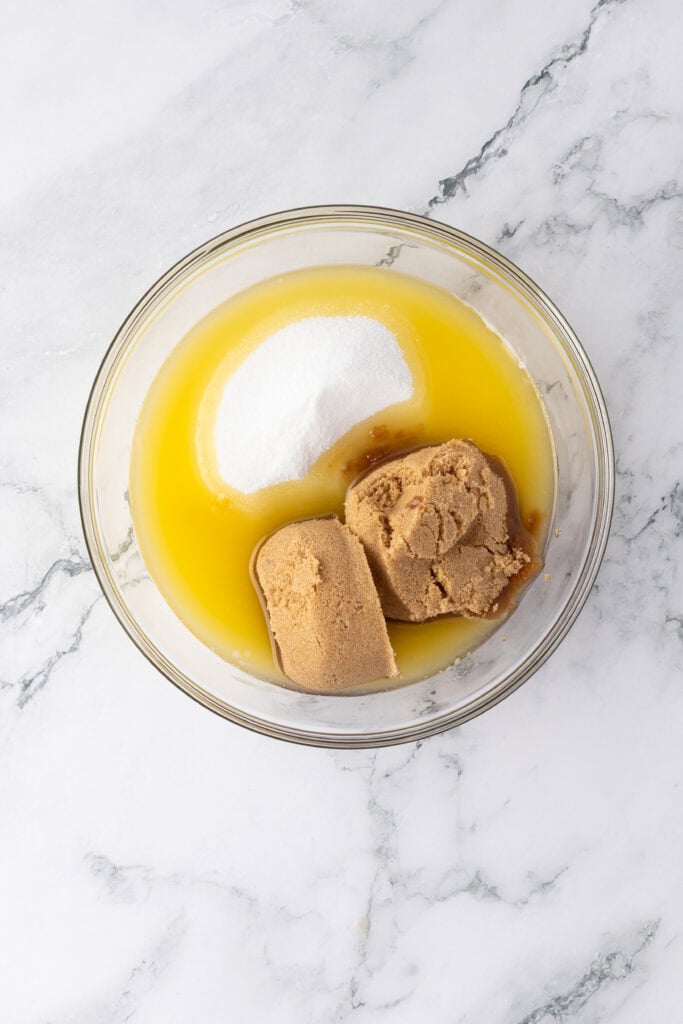 butter and sugars in a bowl